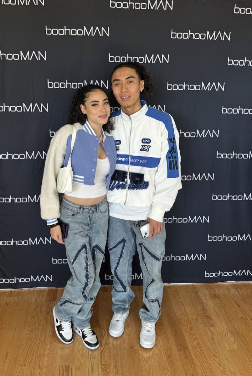 Creators in gifted boohooMAN outfits at the press wall