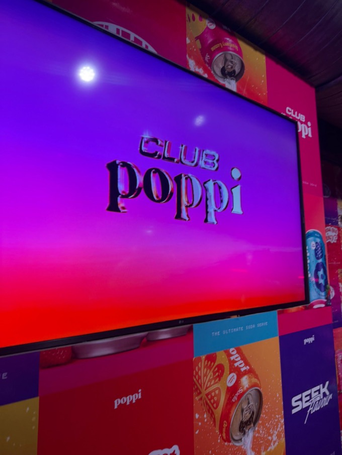 Club Poppi title screen at the London launch