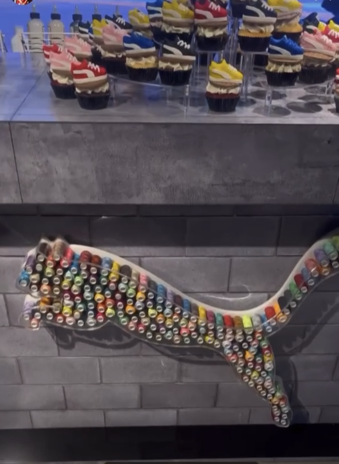 Puma cupcakes above a thread-spool Puma logo at the NYC launch
